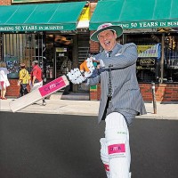 Tom playing cricket on the streets of Kensington Market