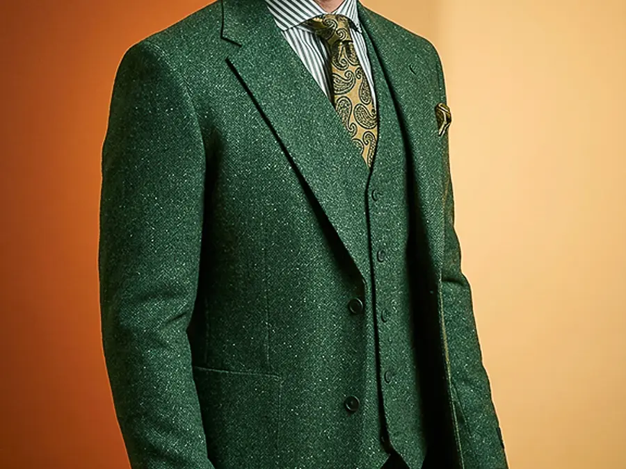 A green three-piece suit is a beautiful statement in texture with the addition of a luxurious vest, it will turn heads. A matching tie and pocket square can lend extra elegance. green-suit-and vest